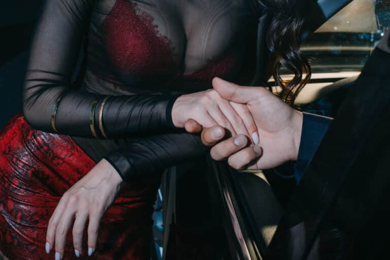 Woman meets man at car